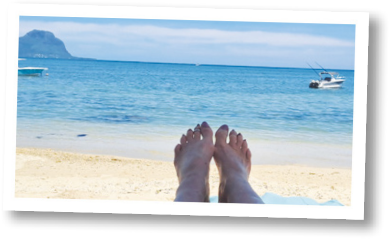 Sisters doing it for themselves - Mauritius laying on beach